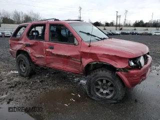 1998 Isuzu Rodeo S z VIN 4S2CM58W5W4350575, wystawiony jako Copart lot #84537714 z przebiegiem 215 573 mil mil oraz Szkoda całkowita • Salvage title. Historia ofert i sprzedaży dostępna na DreamBid. Obrazek 4.