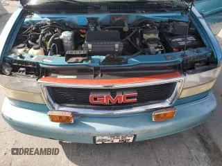 1995 GMC Safari z VIN 1GDDM19W2SB525888, wystawiony jako Copart lot #81358954 z przebiegiem 121 066 mil mil oraz Szkody całkowita. Historia ofert i sprzedaży dostępna na DreamBid. Obrazek 12.