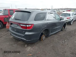 2020 Dodge Durango GT Plus with VIN 1C4RDJDG4LC260932, listed as a IAAI auction lot 41833117 with 104,930 mi miles and . Bid and sale history available at DreamBid. Image 4.