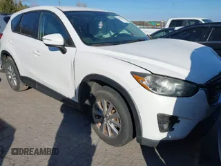 2016 Mazda CX-5 Touring with VIN JM3KE2CY9G0807688, listed as a IAAI auction lot 41039438 with 169,483 mi miles. Bid and sale history available at carsss.com. Image 1.