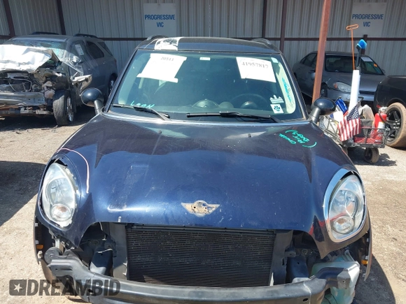 2014 MINI Countryman S with VIN WMWZC3C5XEWP27221, listed as a IAAI auction lot 41957817 with 112,353 mi miles and . Bid and sale history available at DreamBid. Image 13.