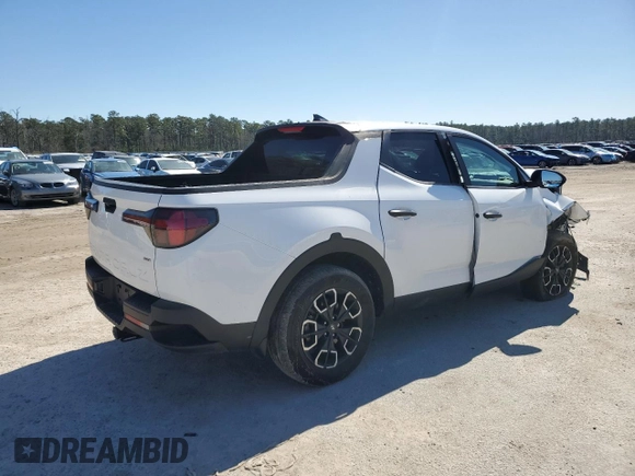 2022 Hyundai Santa Cruz SEL z VIN 5NTJBDAE5NH014097, wystawiony jako Copart lot #46309765 z przebiegiem 24 938 mil mil oraz Szkoda całkowita • Salvage title. Historia ofert i sprzedaży dostępna na DreamBid. Obrazek 3.