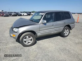 1999 Toyota RAV4 with VIN JT3GP10V5X7053634, listed as a Copart auction lot 52761695 with 236,443 mi miles and Salvage Title. Bid and sale history available at DreamBid. Image 1.