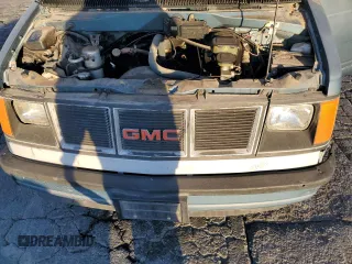 1986 GMC Safari z VIN 1GDDM15Z1GB521872, wystawiony jako Copart lot #87655995 z przebiegiem 30 889 mil mil oraz Szkody całkowita. Historia ofert i sprzedaży dostępna na DreamBid. Obrazek 12.