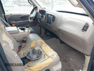 2001 Ford F-150 XLT z VIN 1FTRW07W61KA23644, wystawiony jako IAAI lot #42162523 z przebiegiem 203 636 mil mil oraz . Historia ofert i sprzedaży dostępna na DreamBid. Obrazek 5.