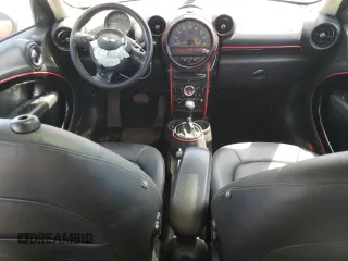 2015 MINI Countryman with VIN WMWZB3C56FWR44186, listed as a Copart auction lot 53636785 with 115,472 mi miles and Salvage Title. Bid and sale history available at DreamBid. Image 8.