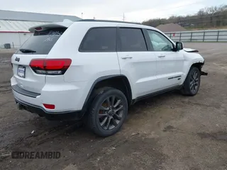 2016 Jeep Grand Cherokee Limited 75th Anniversary with VIN 1C4RJFBG5GC377529, listed as a IAAI auction lot 41961815 with 136,297 mi miles and . Bid and sale history available at DreamBid. Image 4.
