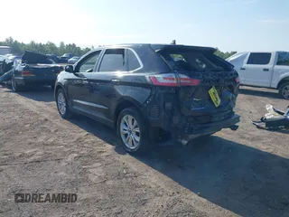 2022 Ford Edge Titanium with VIN 2FMPK4K99NBA45354, listed as a IAAI auction lot 42187761 with 75,458 mi miles and . Bid and sale history available at DreamBid. Image 3.