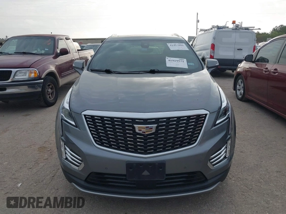 2021 Cadillac XT5 FWD Premium Luxury with VIN 1GYKNCRS5MZ128908, listed as a IAAI auction lot 41919571 with 51,280 mi miles and . Bid and sale history available at carsss.com. Image 13.