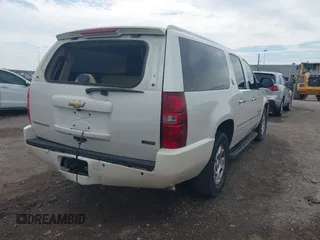 2010 Chevrolet Suburban LTZ with VIN 1GNUCKE03AR248244, listed as a IAAI auction lot 41677238 with 184,698 mi miles. Bid and sale history available at carsss.com. Image 4.