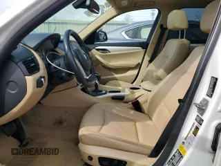 2015 BMW X1 xDrive28i with VIN WBAVL1C58FVY28445, listed as a Copart auction lot 49148015 with 144,319 mi miles and Clean Title. Bid and sale history available at carsss.com. Image 7.