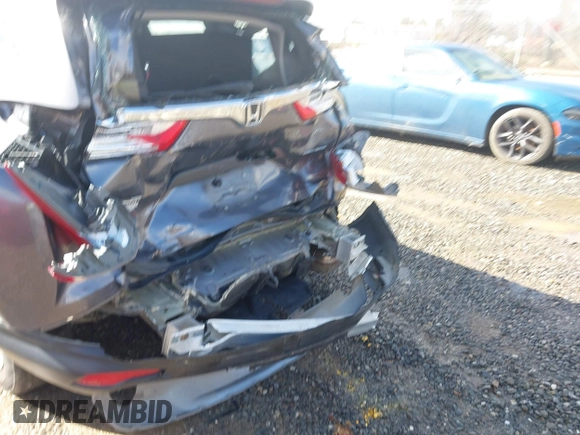 2018 Honda CR-V LX z VIN 2HKRW6H34JH202657, wystawiony jako IAAI lot #41568088 z przebiegiem Nie podano mil oraz . Historia ofert i sprzedaży dostępna na DreamBid. Obrazek 6.
