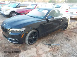 2015 BMW 2 Series 228i with VIN WBA1F5C55FV256604, listed as a IAAI auction lot 41841754 with 118,354 mi miles. Bid and sale history available at carsss.com. Image 17.