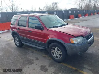 2004 Ford Escape XLT with VIN 1FMYU031X4KA40183, listed as a IAAI auction lot 41642342 with 363,338 mi miles. Bid and sale history available at carsss.com. Image 1.