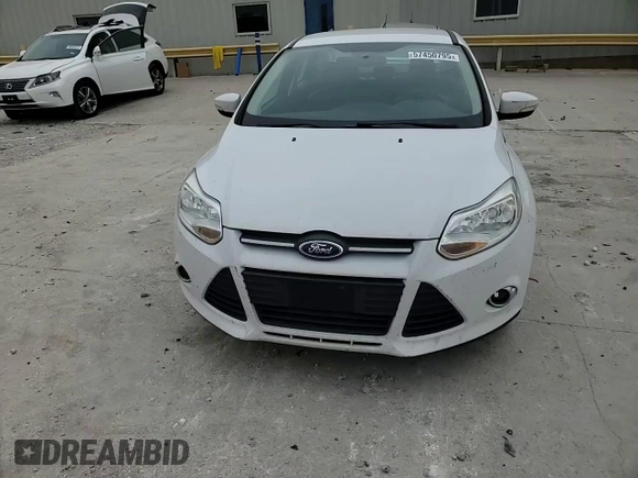 2013 Ford Focus SE z VIN 1FADP3F23DL108047, wystawiony jako Copart lot #57450795 z przebiegiem 67 518 mil mil oraz Szkoda całkowita • Salvage title. Historia ofert i sprzedaży dostępna na DreamBid. Obrazek 13.