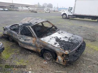 1991 Toyota Camry z VIN JT2SV21EXM3434326, wystawiony jako IAAI lot #40994388 z przebiegiem Nie podano mil oraz . Historia ofert i sprzedaży dostępna na DreamBid. Obrazek 6.