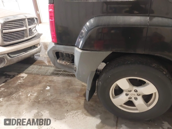 2005 Nissan Xterra S with VIN 5N1AN08U95C633157, listed as a IAAI auction lot 41277946 with 213,067 mi miles. Bid and sale history available at carsss.com. Image 6.
