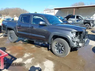 2023 Toyota Tacoma 4WD SR with VIN 3TYCZ5AN6PT130581, listed as a IAAI auction lot 39036025 with 19,846 mi miles. Bid and sale history available at carsss.com. Image 1.