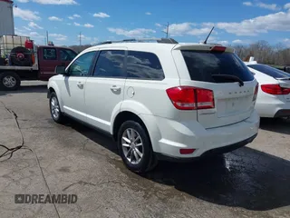 2017 Dodge Journey SXT with VIN 3C4PDCBB5HT564454, listed as a IAAI auction lot 41876498 with 198,035 mi miles and . Bid and sale history available at DreamBid. Image 3.
