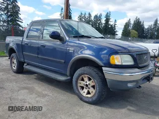 2003 Ford F-150 XLT with VIN 1FTRW08L93KD64270, listed as a IAAI auction lot 42088905 with 181,528 mi miles. Bid and sale history available at carsss.com. Image 1.
