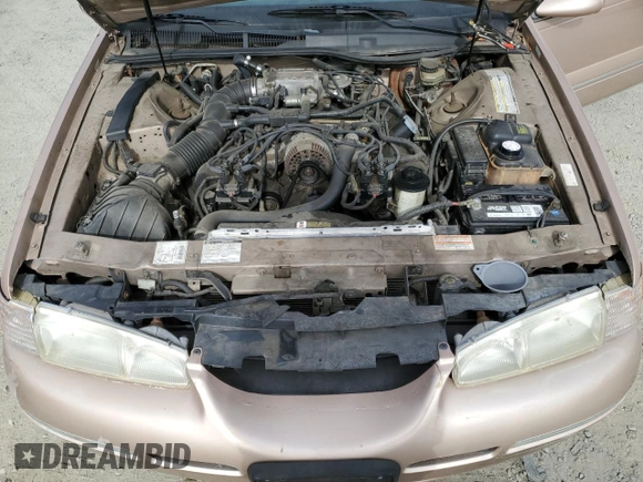 1996 Mercury Cougar z VIN 1MELM62W3TH600523, wystawiony jako Copart lot #78253454 z przebiegiem 84 531 mil mil oraz Tytuł czysty. Historia ofert i sprzedaży dostępna na DreamBid. Obrazek 11.