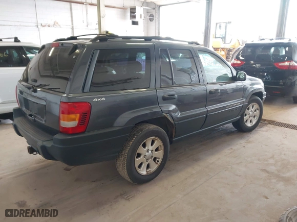 2001 Jeep Grand Cherokee Laredo with VIN 1J4GW48S91C525711, listed as a IAAI auction lot 42048952 with 1 mi miles. Bid and sale history available at carsss.com. Image 4.