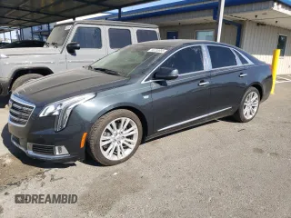 2018 Cadillac XTS Luxury z VIN 2G61M5S31J9151985, wystawiony jako Copart lot #60238955 z przebiegiem 27 105 mil mil oraz Szkoda całkowita • Salvage title. Historia ofert i sprzedaży dostępna na DreamBid. Obrazek 1.