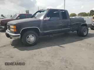 1997 GMC Sierra 2500 z VIN 1GTGC29F4VE539434, wystawiony jako Copart lot #50411315 z przebiegiem Nie podano mil oraz Nie do naprawy. Historia ofert i sprzedaży dostępna na DreamBid. Obrazek 1.
