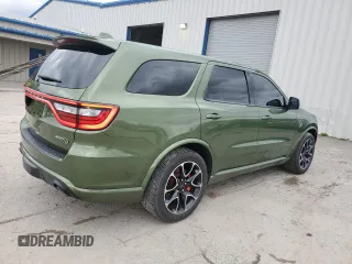 2021 Dodge Durango z VIN NCS107176, wystawiony jako Copart lot #79089354 z przebiegiem 58 735 mil mil oraz Szkoda całkowita • Salvage title. Historia ofert i sprzedaży dostępna na DreamBid. Obrazek 3.