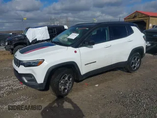 2022 Jeep Compass Trailhawk z VIN 3C4NJDDB7NT226018, wystawiony jako IAAI lot #40929794 z przebiegiem 25 702 mil mil oraz . Historia ofert i sprzedaży dostępna na DreamBid. Obrazek 17.