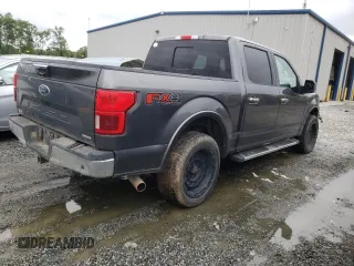 2018 Ford F-150 XL with VIN 1FTEW1EG1JFD48582, listed as a Copart auction lot 58170925 with 219,888 mi miles and Clean title. Bid and sale history available at DreamBid. Image 3.