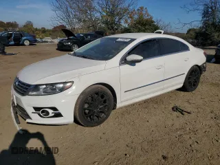 2014 Volkswagen CC R-Line with VIN WVWBP7AN2EE503420, listed as a Copart auction lot 77744894 with 99,679 mi miles and Salvage Title. Bid and sale history available at carsss.com. Image 1.