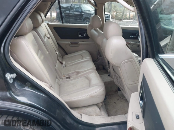 2004 Cadillac SRX with VIN 1GYEE63A440162356, listed as a IAAI auction lot 41380359 with 228,656 mi miles. Bid and sale history available at carsss.com. Image 8.