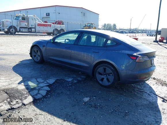 2023 Tesla Model 3 with VIN 5YJ3E1EA0PF485869, listed as a IAAI auction lot 41763996 with 17,092 mi miles. Bid and sale history available at carsss.com. Image 3.
