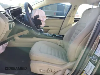 2016 Ford Fusion SE Hybrid with VIN 3FA6P0LU3GR307666, listed as a Copart auction lot 57444365 with 127,786 mi miles and Salvage title. Bid and sale history available at DreamBid. Image 7.