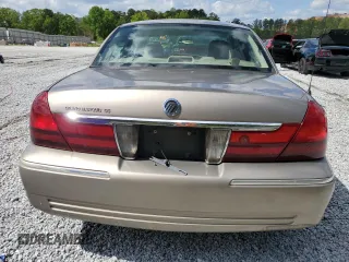 2005 Mercury Grand Marquis GS z VIN 2MEFM74W05X673934, wystawiony jako Copart lot #52608785 z przebiegiem 170 558 mil mil oraz Szkody całkowita. Historia ofert i sprzedaży dostępna na DreamBid. Obrazek 6.
