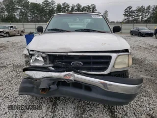 2000 Ford F-150 XL z VIN 1FTRX17WXYNB88124, wystawiony jako Copart lot #43602225 z przebiegiem Nie podano mil oraz Szkoda całkowita • Salvage title. Historia ofert i sprzedaży dostępna na DreamBid. Obrazek 5.