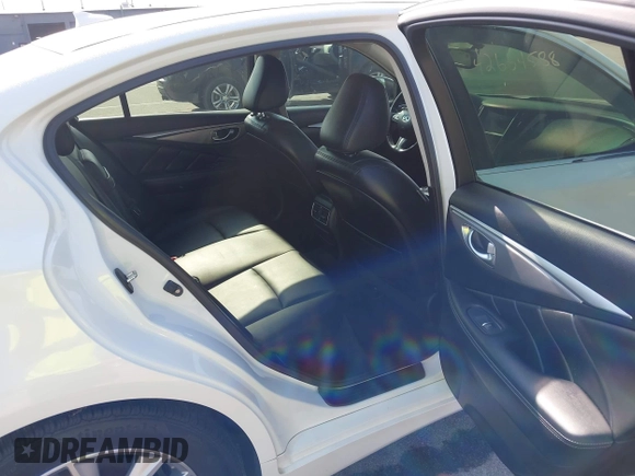 2014 Infiniti Q50 Sport with VIN JN1BV7AR4EM698230, listed as a IAAI auction lot 42664588 with 129,411 mi miles and . Bid and sale history available at DreamBid. Image 8.
