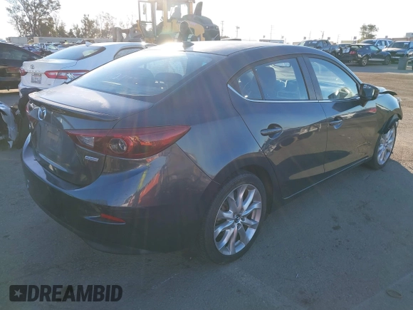 2014 Mazda 3 S Grand Touring with VIN JM1BM1W36E1112033, listed as a IAAI auction lot 41412655 with 115,050 mi miles and . Bid and sale history available at DreamBid. Image 4.