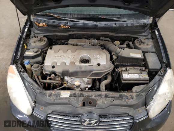 2006 Hyundai Accent GLS z VIN KMHCN46C56U036710, wystawiony jako Copart lot #84831284 z przebiegiem 202 556 mil mil oraz Nie do naprawy • Non repairable. Historia ofert i sprzedaży dostępna na DreamBid. Obrazek 12.