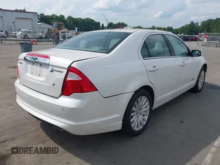 2012 Ford Fusion Hybrid с VIN 3FADP0L39CR216555, выставлен на аукционе IAAI как лот 42506669 с пробегом 171 346 миль миль и . История ставок и продаж доступна на DreamBid. Изображение 4.