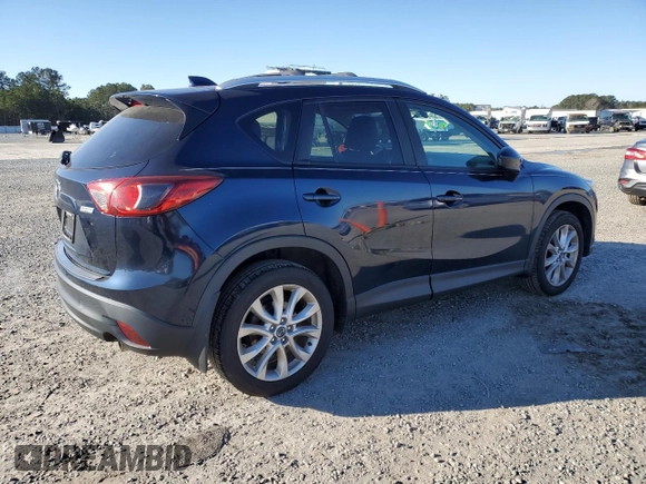 2014 Mazda CX-5 Grand Touring with VIN JM3KE4DY1E0405493, listed as a Copart auction lot 41688915 with 94,970 mi miles and Salvage Title. Bid and sale history available at carsss.com. Image 3.