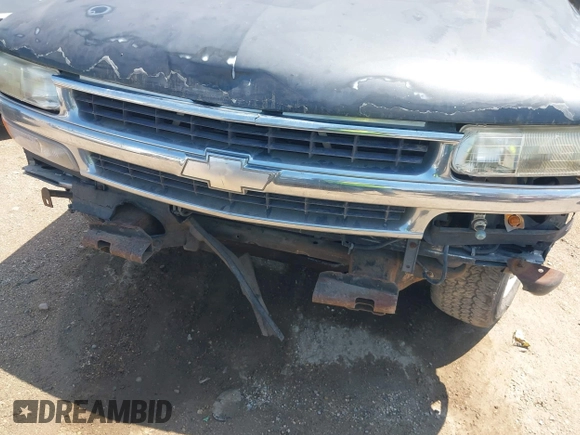 2004 Chevrolet Tahoe LS with VIN 1GNEC13T04R156427, listed as a IAAI auction lot 42333312 with 303,040 mi miles and . Bid and sale history available at DreamBid. Image 6.