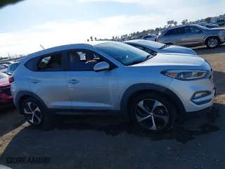 2016 Hyundai Tucson Sport with VIN KM8J33A20GU152145, listed as a IAAI auction lot 41250885 with 117,841 mi miles. Bid and sale history available at carsss.com. Image 13.
