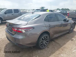 2023 Toyota Camry LE z VIN 4T1C11AK8PU132325, wystawiony jako IAAI lot #42093856 z przebiegiem 29 115 mil mil oraz . Historia ofert i sprzedaży dostępna na DreamBid. Obrazek 4.