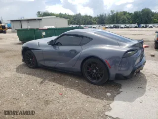 2023 Toyota GR Supra 3.0 with VIN WZ1DB0G02PW055771, listed as a Copart auction lot 61064854 with 19,406 mi miles and Salvage Title. Bid and sale history available at carsss.com. Image 2.