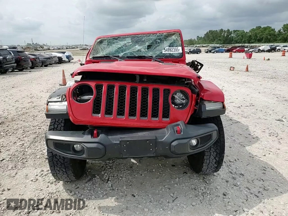2020 Jeep Gladiator Rubicon z VIN 1C6JJTBG4LL167159, wystawiony jako Copart lot #54992395 z przebiegiem 73 906 mil mil oraz Szkoda całkowita • Salvage title. Historia ofert i sprzedaży dostępna na DreamBid. Obrazek 14.