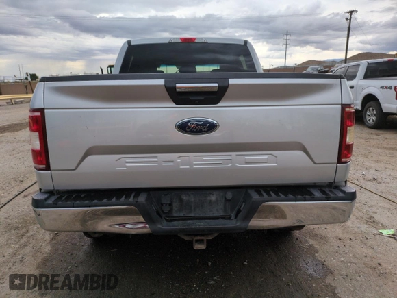 2018 Ford F-150 XL with VIN 1FTEW1E57JKC62666, listed as a Copart auction lot 61619235 with 149,759 mi miles and Clean title. Bid and sale history available at DreamBid. Image 6.