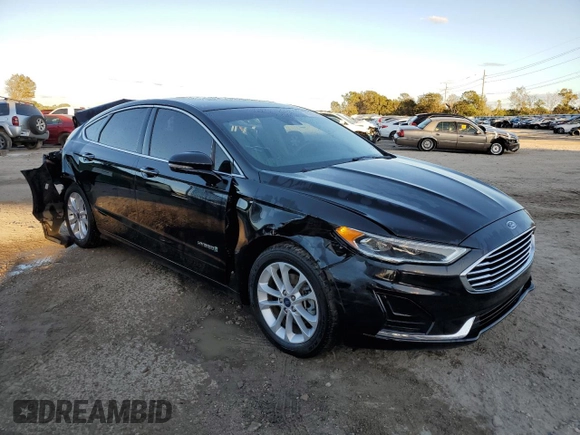 2019 Ford Fusion Hybrid SEL with VIN 3FA6P0MU7KR260813, listed as a Copart auction lot 73311492 with 70,783 mi miles. Bid and sale history available at carsss.com. Image 4.