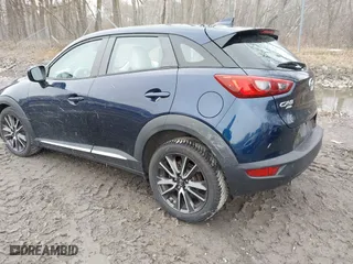2017 Mazda CX-3 Grand Touring with VIN JM1DKFD75H0179167, listed as a IAAI auction lot 41980243 with 69,076 mi miles. Bid and sale history available at carsss.com. Image 3.